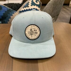 Travis Mathew Light Blue Snapback Hat with Round Beach Logo Patch